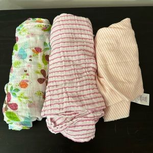 3 girls swaddles